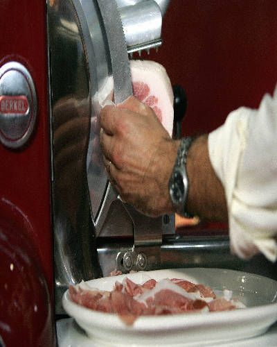 Watch, Food, Ingredient, Wrist, Animal product, Cuisine, Meat, Small appliance, Red meat, Dish, 