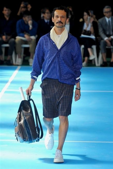 Shoulder, Shirt, Joint, Fashion show, Style, Shorts, Luggage and bags, Runway, Knee, Fashion, 