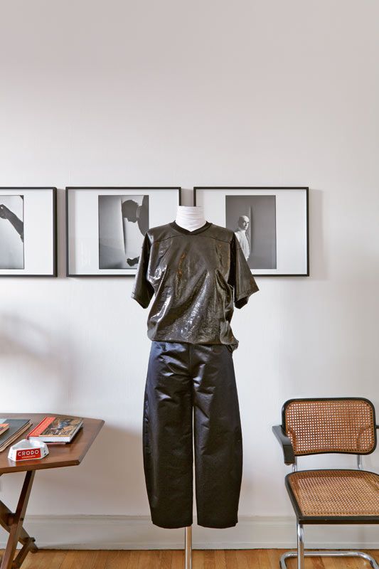 Sleeve, Collar, Chair, Picture frame, Visual arts, Fashion design, Clothes hanger, Collection, Costume design, Leather, 