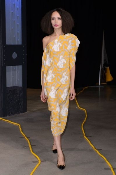 Clothing, Yellow, Shoulder, Joint, Dress, Style, Floor, One-piece garment, Fashion, Fashion model, 