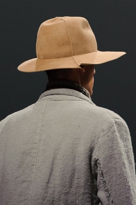 Clothing, Hat, Brown, Sleeve, Shoulder, Joint, White, Standing, Style, Fashion accessory, 