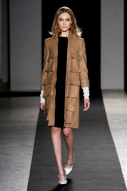 Clothing, Brown, Fashion show, Shoulder, Joint, Human leg, Outerwear, Runway, Style, Fashion model, 