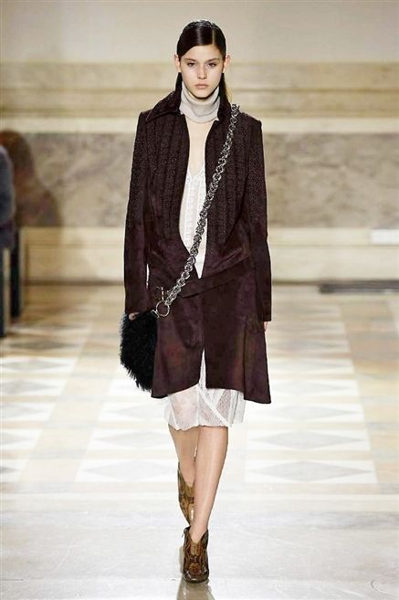 Clothing, Brown, Shoulder, Fashion show, Textile, Human leg, Joint, Outerwear, Style, Runway, 