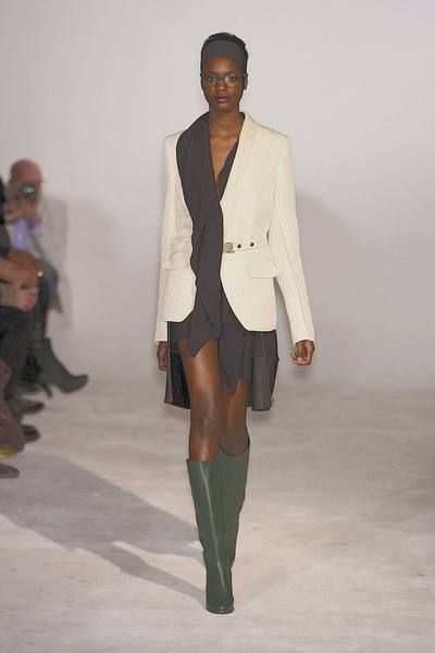 Clothing, Leg, Brown, Human body, Sleeve, Fashion show, Shoulder, Joint, Outerwear, Standing, 
