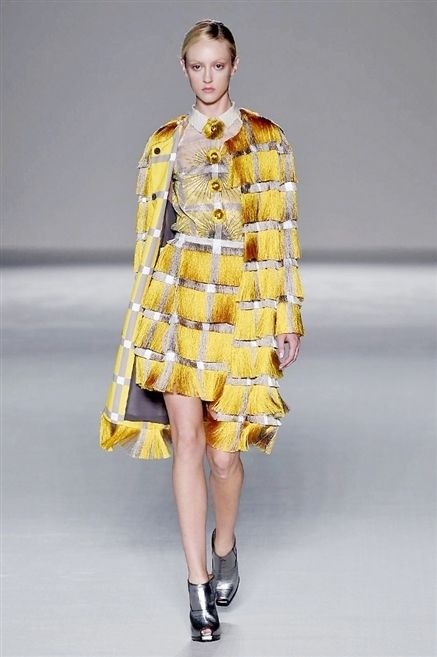 Clothing, Footwear, Fashion show, Yellow, Sleeve, Human body, Shoulder, Textile, Joint, Runway, 