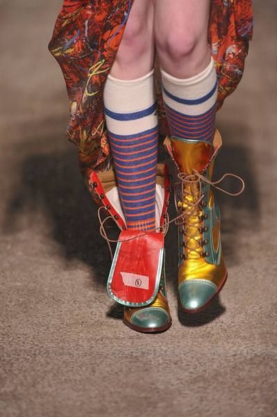 Human leg, Joint, Carmine, Ankle, Tradition, Fashion design, Sock, Brass, 