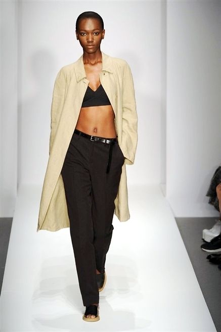 Brown, Fashion show, Sleeve, Human body, Shoulder, Joint, Outerwear, Runway, Style, Fashion model, 