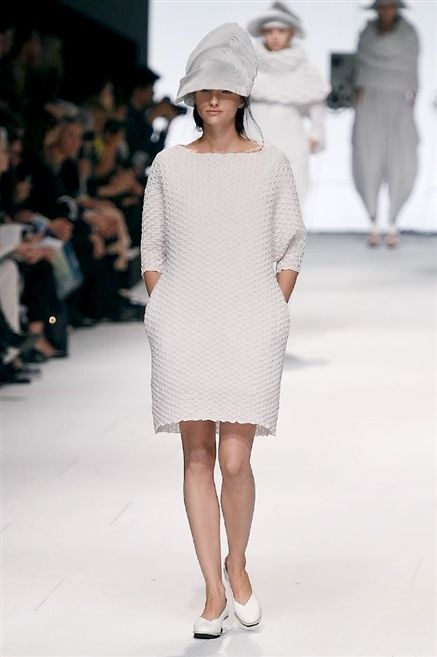 Clothing, Footwear, Leg, Sleeve, Shoulder, Fashion show, Joint, White, Human leg, Runway, 