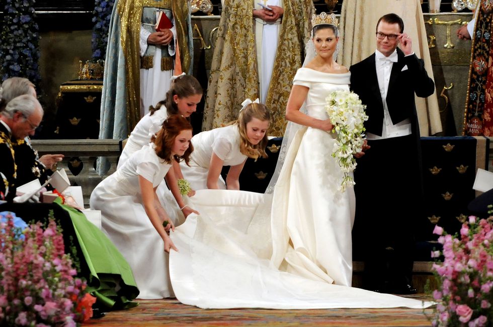 Bridal clothing, Event, Trousers, Dress, Photograph, Coat, Wedding dress, Petal, Bride, Gown, 
