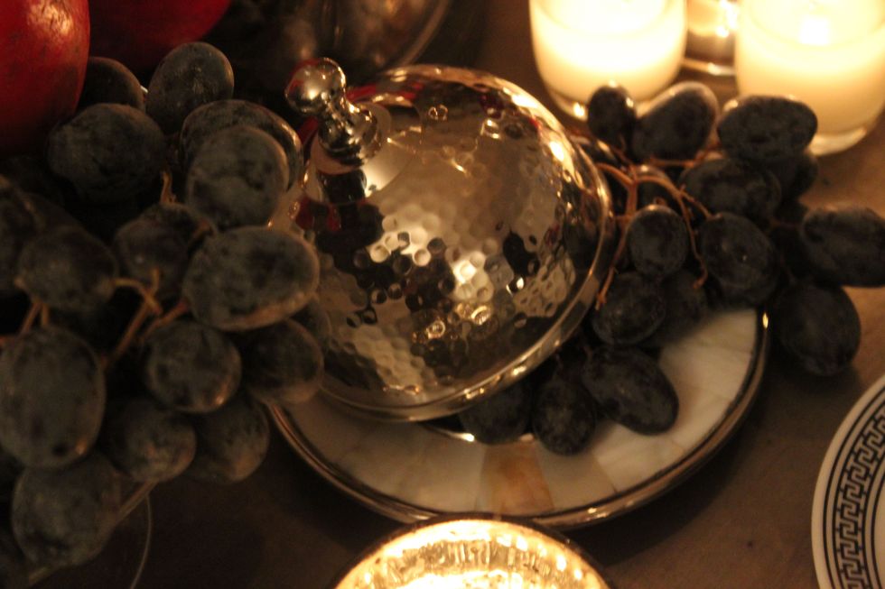 Seedless fruit, Candle, Serveware, Wax, Berry, Dishware, Fruit, Grapevine family, Still life photography, Candle holder, 