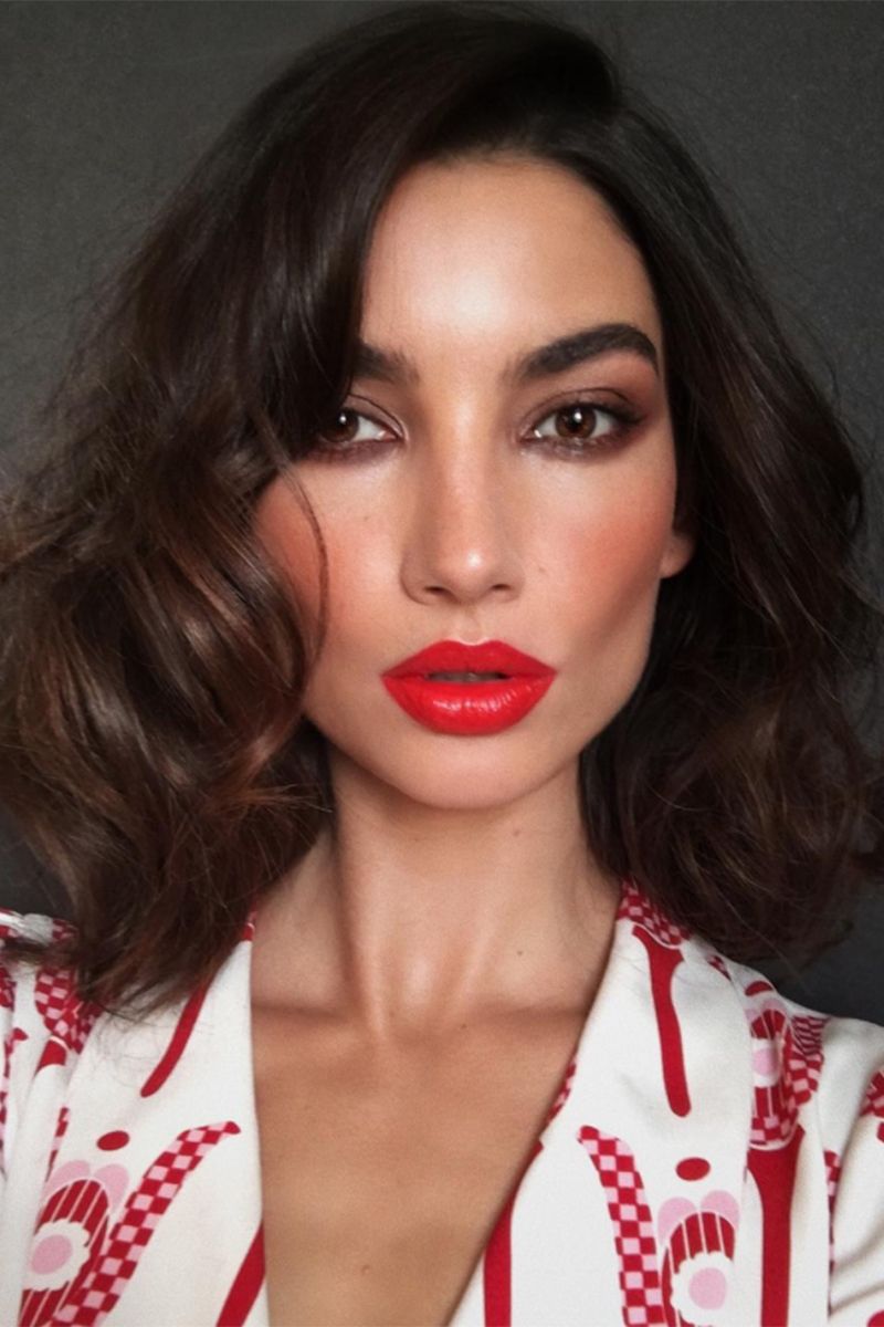 <p>Lily Aldridge wearing a poppy-red lipstick by makeup artist Hung Vanngo on Instagram.</p>