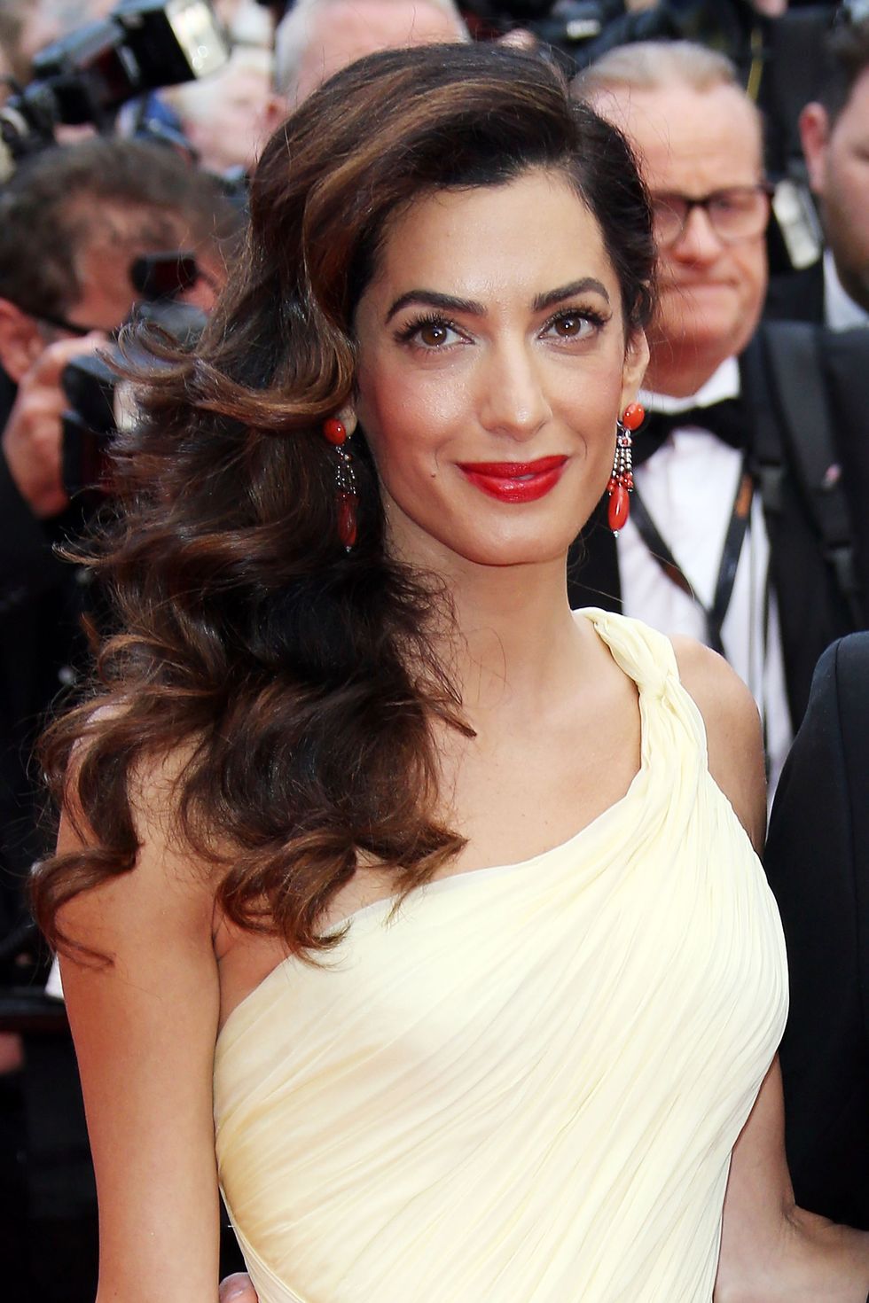 <p>The lawyer and activist's ruby lips stood out at the Cannes premiere of her husband's film <em data-redactor-tag="em" data-verified="redactor">Money Monster.</em></p>