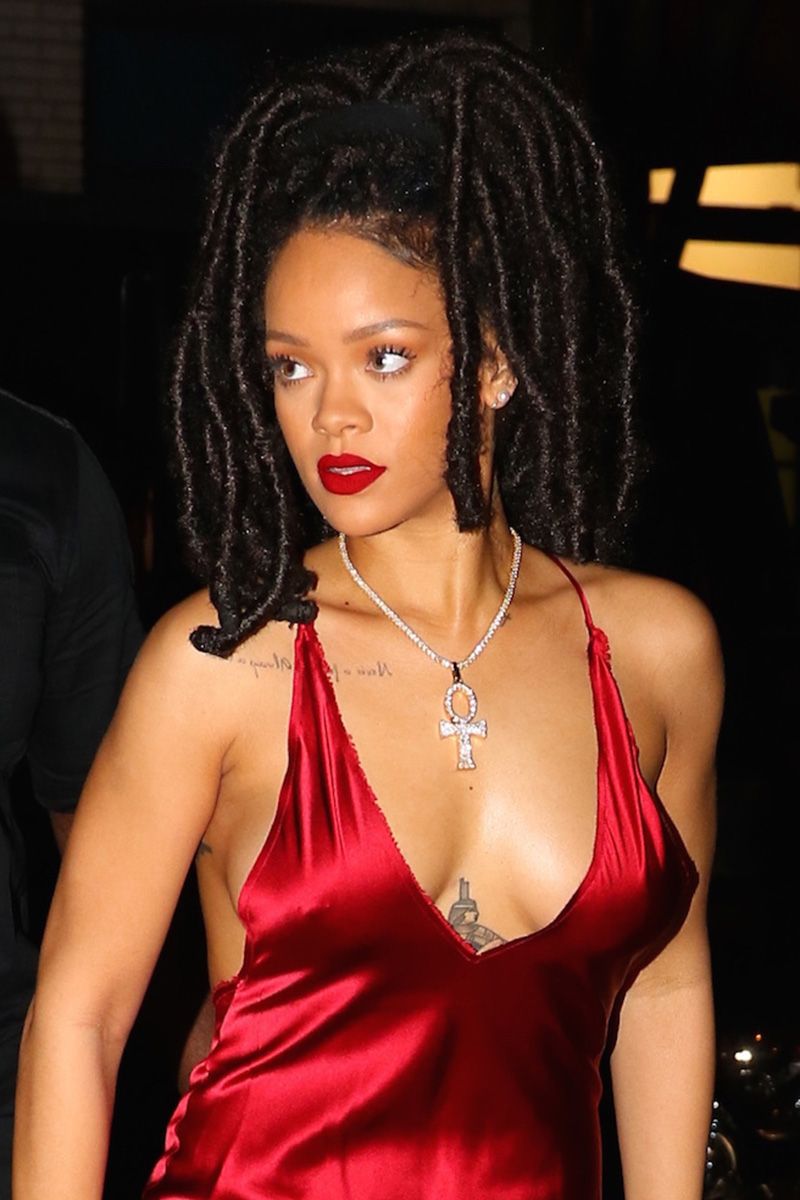 <p>Rihanna owns&nbsp;the color red with her&nbsp;silky dress and matching lips.<span class="redactor-invisible-space" data-verified="redactor" data-redactor-tag="span" data-redactor-class="redactor-invisible-space"></span></p>