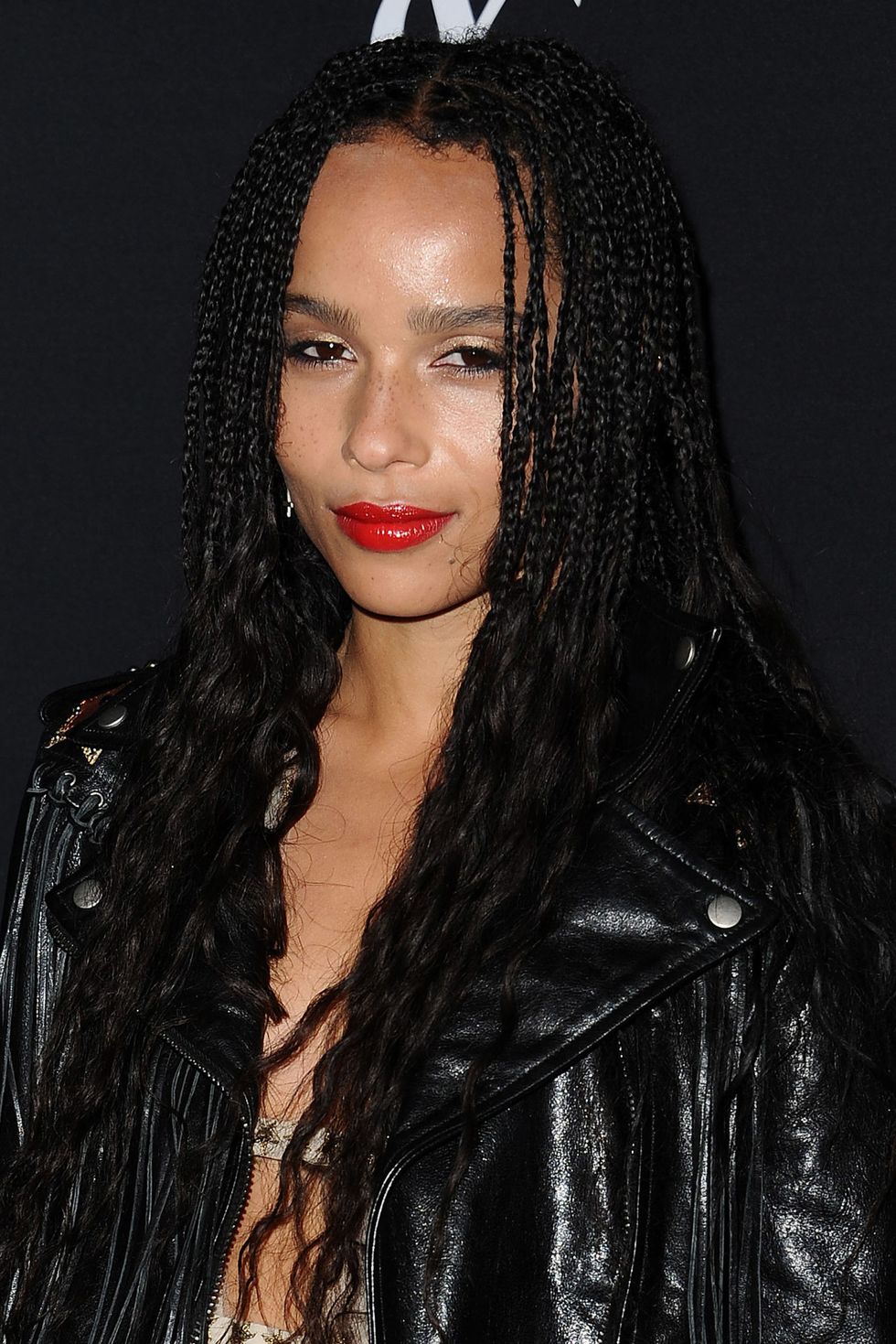 <p>A bright red lipstick paired perfectly with Kravitz's black leather jacket.<span class="redactor-invisible-space" data-verified="redactor" data-redactor-tag="span" data-redactor-class="redactor-invisible-space"></span></p>