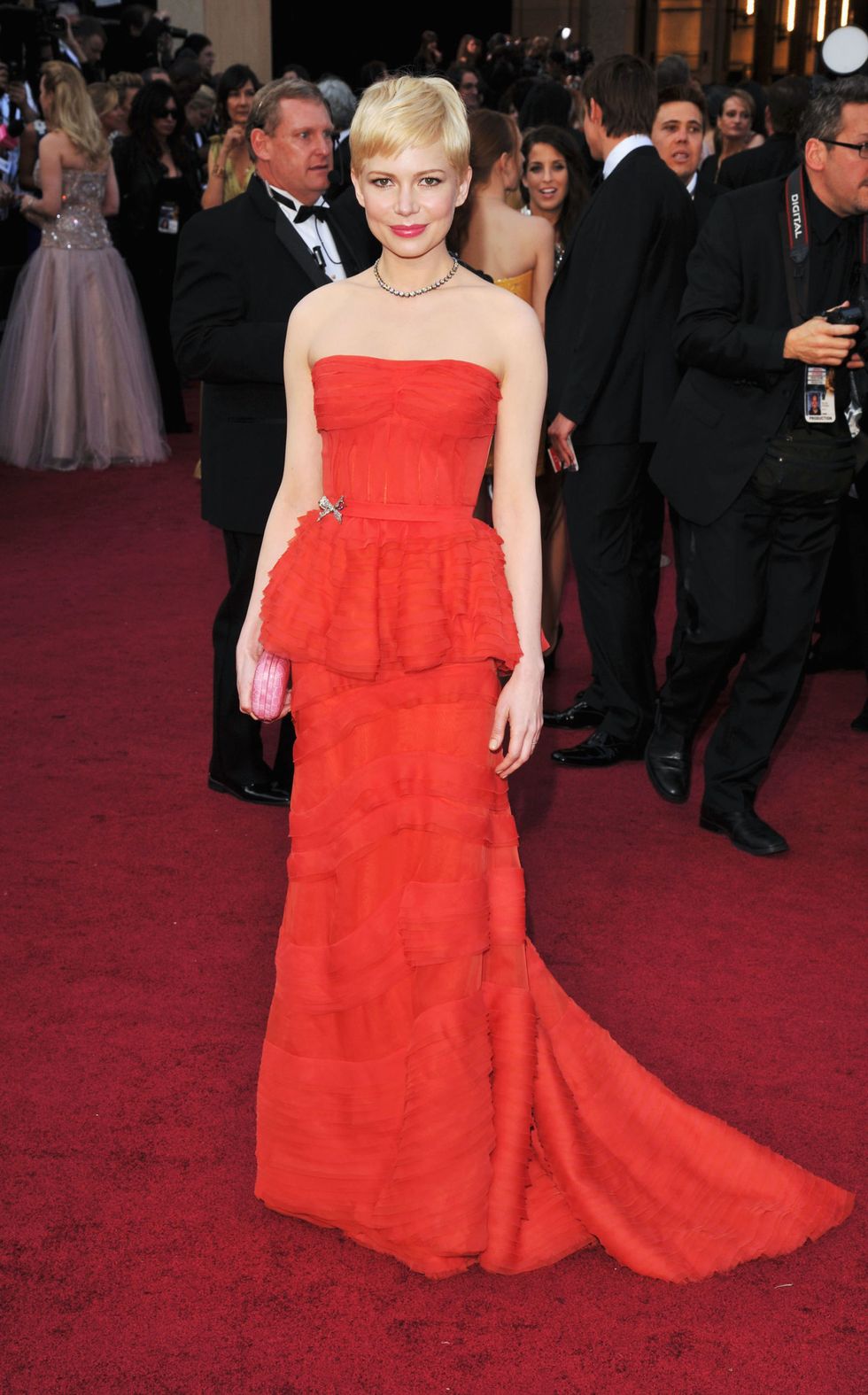 <p>Her saffron yellow gown from the 2006 Oscars is a crowd favorite, but this 2012 Oscars look by Louis Vuitton (with a super trendy peplum) was pretty unforgettable, too. </p>