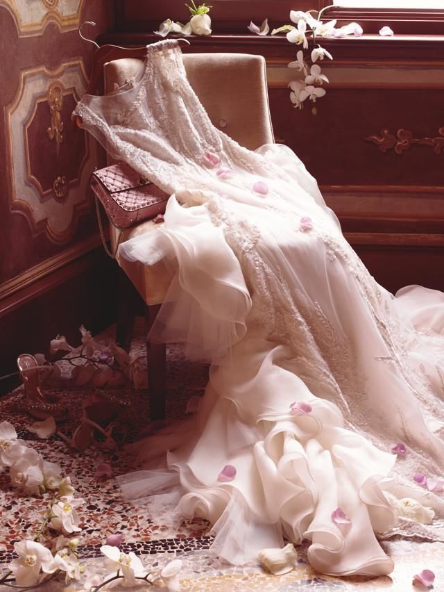 Petal, Bridal clothing, Dress, Wedding dress, Gown, Bridal accessory, Embellishment, Veil, Ivory, Peach, 