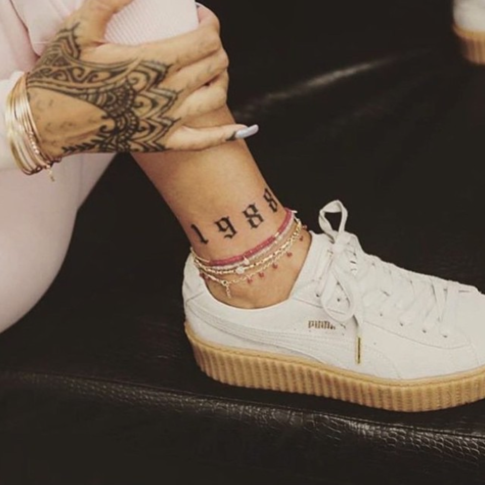 <p>RiRi had 1988, the year she was born, inked on her right ankle by Bang Bang, because of course.</p>