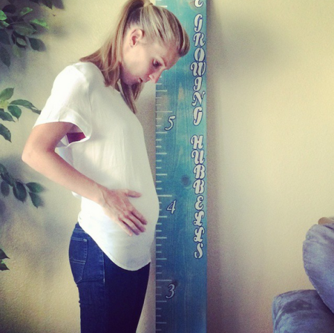 <p>The <em>Glee</em> star and mom of one Instagrammed this baby-bump shot next to a life-size yardstick with the caption, "😍😍😘 #thegrowinghubbells." </p><p>Props for the props.</p>