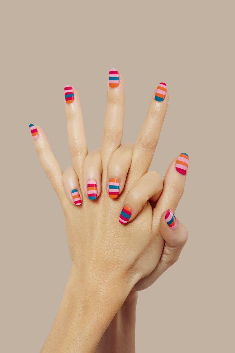 <p>Rainbow stripes are a no-brainer for&nbsp;summer, and&nbsp;Poole's&nbsp;taking note from the technicolor runways at&nbsp;Marc Jacobs,&nbsp;Fendi, and&nbsp;Altuzarra. "When painting your nails with a striped look, start with the most sheer and light color first," Poole recommended.&nbsp;For those who aren't about perfectly straight lines, Poole also suggested "choosing&nbsp;4 or 5 different shades from the 80's revival palette and layering them by using a <a href="http://shop.nordstrom.com/s/red-carpet-manicure-nail-art-tool-kit/4095155?cm_mmc=google-_-productads-_-Women%3APersonalCareAccessories%3ANailcare-_-1166856&amp;rkg_id=h-896a1c805784a495af950ea21c9956b9_t-1485187678&amp;adpos=1o1&amp;creative=57187616753&amp;device=c&amp;network=g&amp;gclid=COP07p_T2NECFVdXDQodjgsGvw" target="_blank" data-tracking-id="recirc-text-link">striping brush</a> to create&nbsp;[...]&nbsp;random order and coloration." The irregularity will give you a painterly finish and mask any mistakes, too.&nbsp;<span class="redactor-invisible-space" data-verified="redactor" data-redactor-tag="span" data-redactor-class="redactor-invisible-space"></span></p>