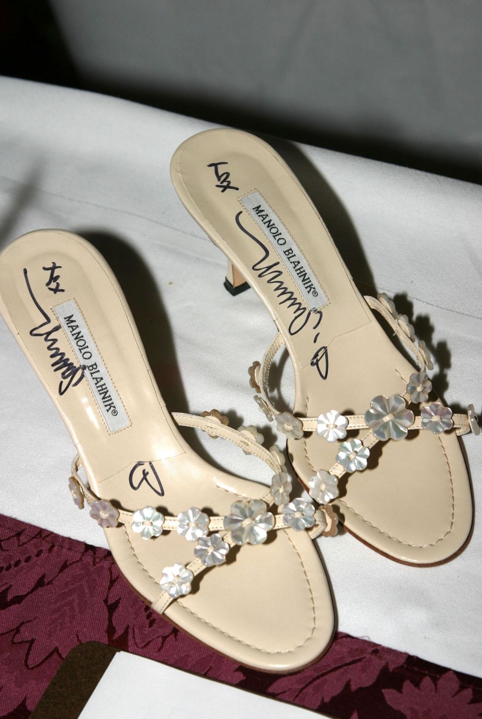 <p>Way back in '03, SJP's signed Manolos sold for $750...we <del>did</del> Googled the math, and that's close to $1,000 in 2016 dollars. </p>