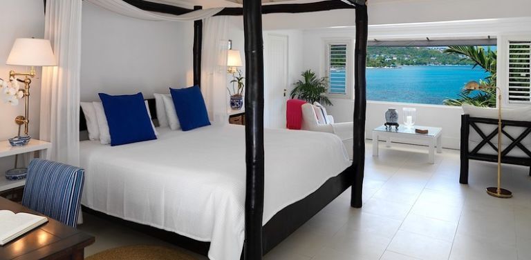<p>The Pineapple House at Jamaica's Round Hill resort comprises of 36 oceanfront guest rooms, all designed under the creative direction of Ralph Lauren. Decorated with furniture from the designer's Home Collection, the rooms feature cool white color palettes, canopy beds and louvered windows opening up to the ocean. </p><p><em>Round Hill Hotel and Villas, <a href="http://www.roundhill.com/oceanfront-rooms-en.html" target="_blank">roundhill.com</a>. </em></p>