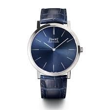 Product, Blue, Watch, Analog watch, Glass, Photograph, White, Watch accessory, Fashion accessory, Font, 