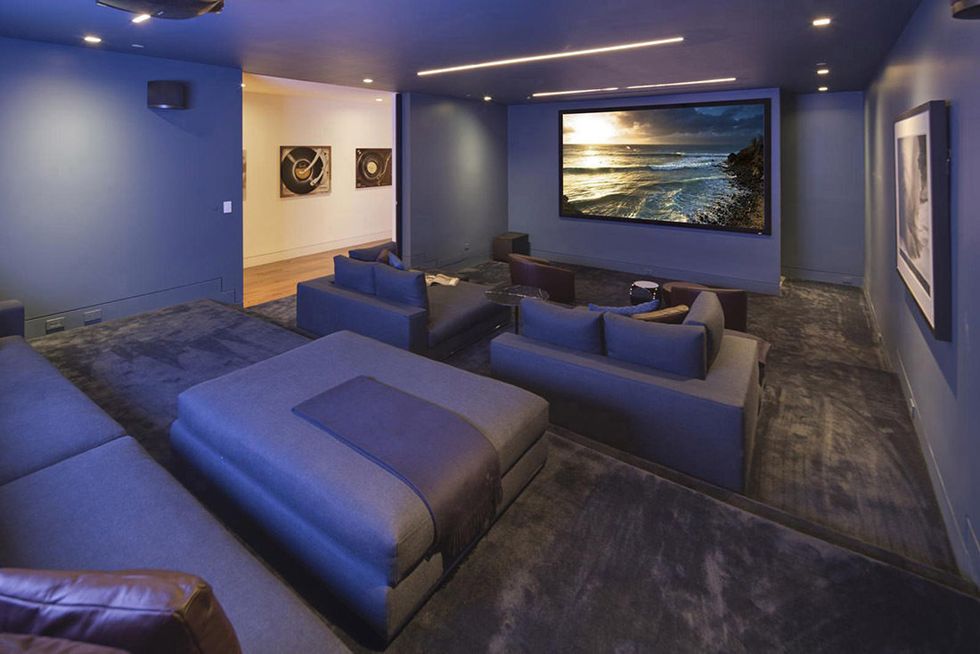 Blue, Lighting, Room, Floor, Interior design, Property, Wall, Ceiling, Couch, Flooring, 