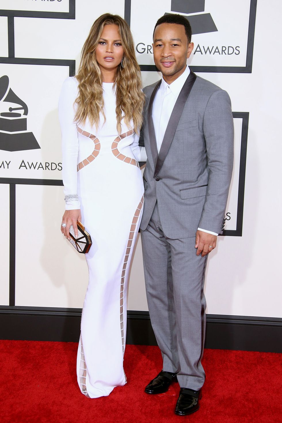 LOS ANGELES, CA - FEBRUARY 08: Chrissie Teigen and John Legend (R) attend The 57th Annual GRAMMY Awards at the STAPLES Center on February 8, 2015 in Los Angeles, California. (Photo by Dan MacMedan/WireImage)