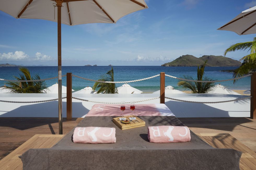 <p>
A recent makeover&nbsp;left the legendarily luxe Cheval Blanc St-Barth Isle de France, now under the LVMH umbrella, even more glittering. Tucked in an idyllic curve of Flamands beach and surrounded by a grove of palm trees, it's the place to see the likes of Jay Z and Beyoncé, Marc Jacobs, and Anthony Kiedis—or, if you prefer, no one at all, with plenty of romantic, sandy nooks to hide away and drink rosé in peace. And with a rumored upcoming purchase of nearby Taiwana, which itself underwent a recent redesign, the Cheval Blanc brand promises even more potential for perfection.&nbsp;</p><p><i data-redactor-tag="i"><a href="http://stbarthisledefrance.chevalblanc.com/" target="_blank" data-tracking-id="recirc-text-link">stbarthisledefrance.chevalblanc.com</a></i><span class="redactor-invisible-space" data-verified="redactor" data-redactor-tag="span" data-redactor-class="redactor-invisible-space"><a href="http://stbarthisledefrance.chevalblanc.com/"></a></span></p>
