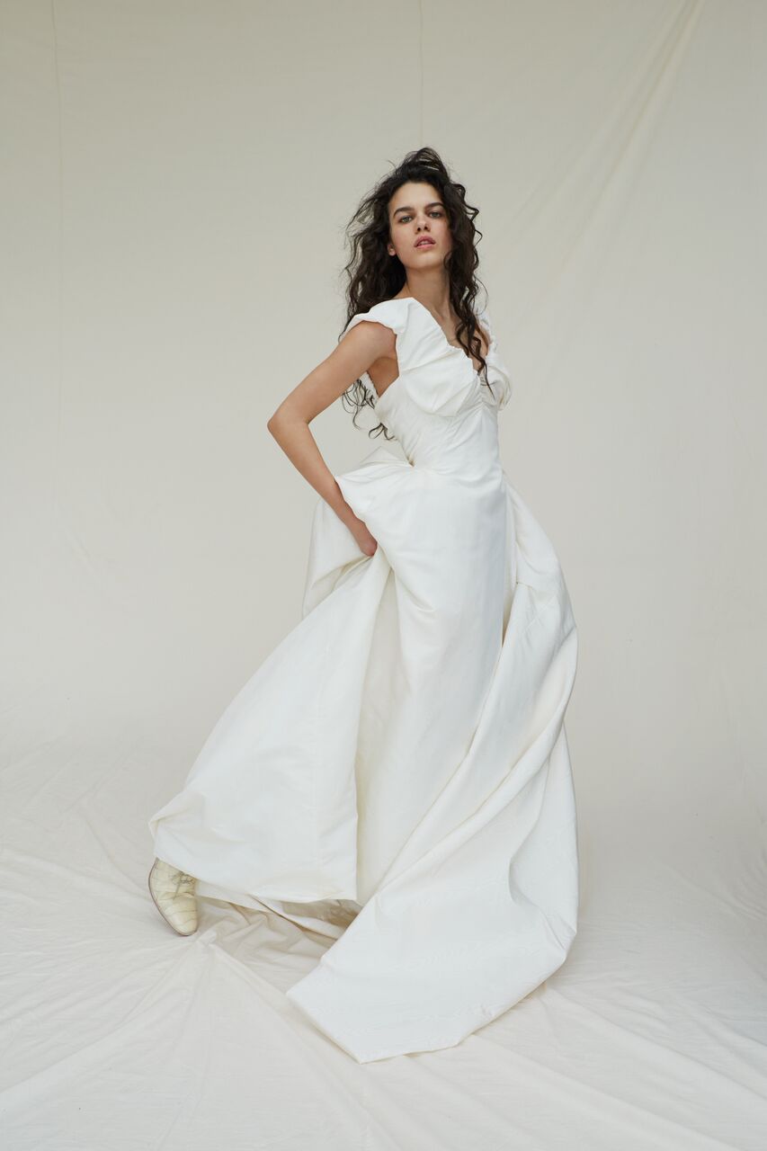 Sleeve, Shoulder, Dress, Bridal clothing, Textile, Gown, Formal wear, Style, Wedding dress, Fashion model, 
