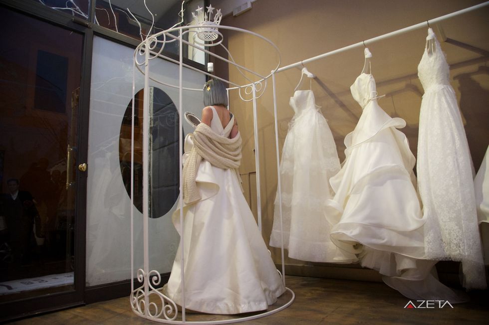 Dress, Bridal clothing, Veil, Wedding dress, Gown, Bridal accessory, Bridal veil, Ivory, Tradition, Bride, 