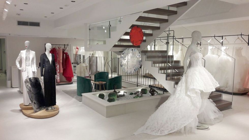 Floor, Ceiling, Bridal clothing, Formal wear, Dress, Interior design, Fashion, Retail, Gown, Bride, 