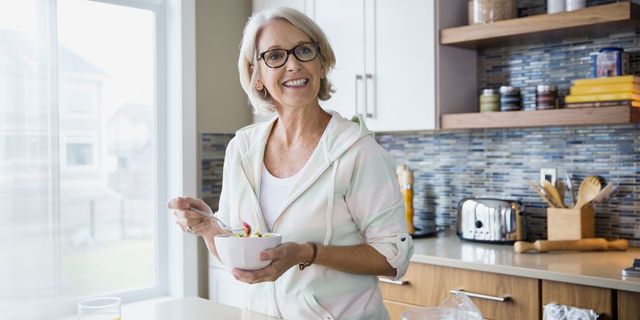 Woman smiling in kitchen