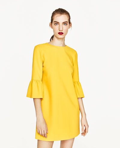 Yellow, Sleeve, Shoulder, Joint, Standing, Elbow, Style, Dress, One-piece garment, Fashion, 