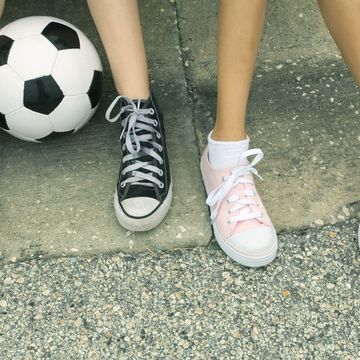 Footwear, Shoe, Ball, Green, Football, Human leg, Soccer ball, White, Ball, Fashion, 