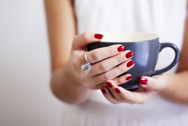 Coffee cup, Cup, Finger, Drinkware, Serveware, Hand, Red, Nail, Dishware, Mug, 