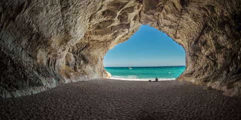 Natural arch, Sea, Formation, Sky, Rock, Sea cave, Coastal and oceanic landforms, Azure, Cave, Arch, 