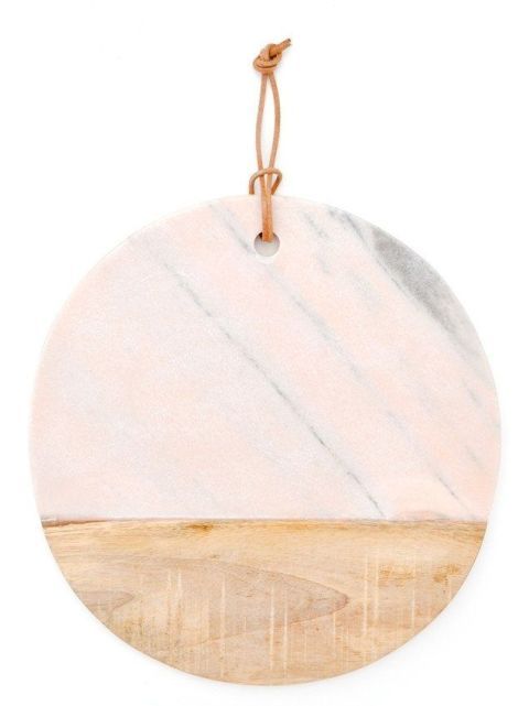 <p><a href="https://www.leifshop.com/products/pink-marble-serving-board" target="_blank">Leif</a></p>