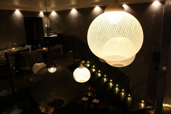 Light, Lighting, Restaurant, Ceiling, Architecture, Room, Sphere, Night, Interior design, Building, 