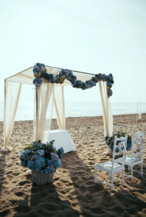 Blue, Table, Arch, Furniture, Architecture, Chair, Textile, Sand, Linens, Ceremony, 
