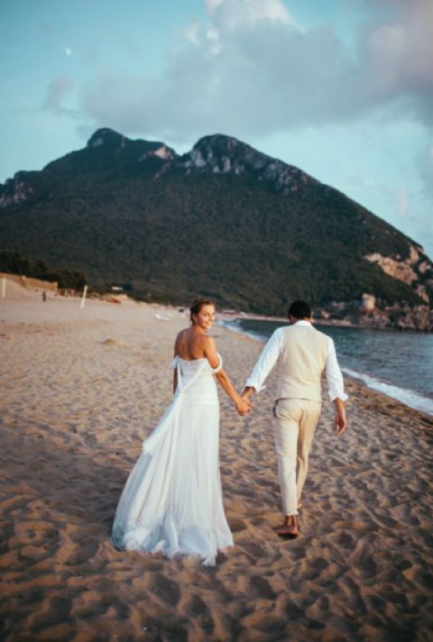 Dress, Trousers, Coastal and oceanic landforms, Mountainous landforms, Photograph, Bridal clothing, Happy, Bride, Wedding dress, Hill, 