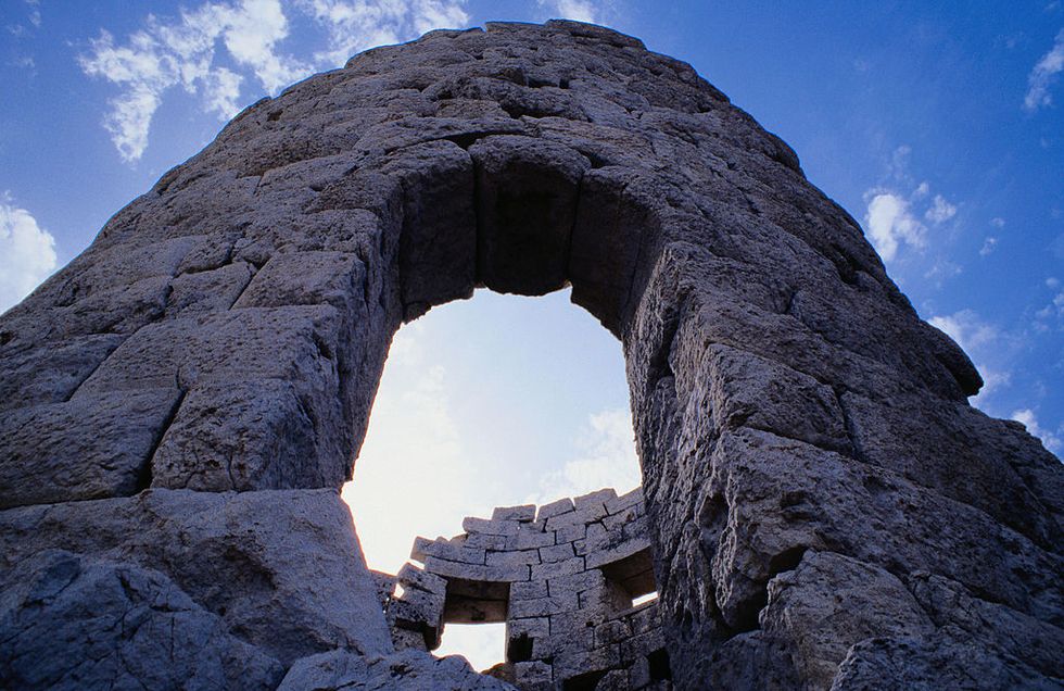 Rock, Sky, Formation, Arch, Ruins, Historic site, Ancient history, Architecture, Natural arch, Landscape, 