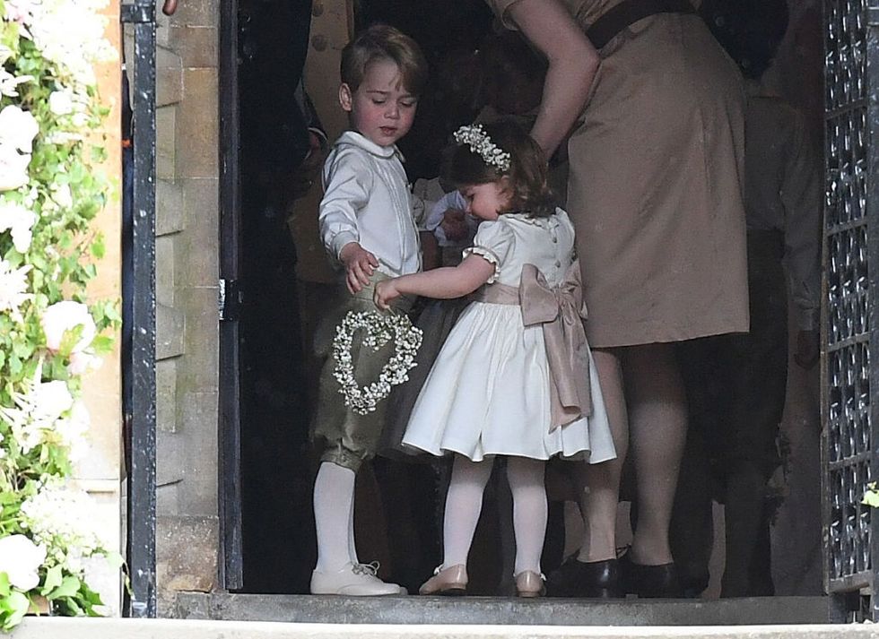 ENGLEFIELD GREEN, ENGLAND - MAY 20:  Prince George of Cambridge, paige boy and Princess Charlotte of Cambridge, bridesmaid attend the wedding of Pippa Middleton and James Matthews at St Mark's Church on May 20, 2017 in Englefield Green, England.  (Photo by Samir Hussein/Samir Hussein/WireImage)