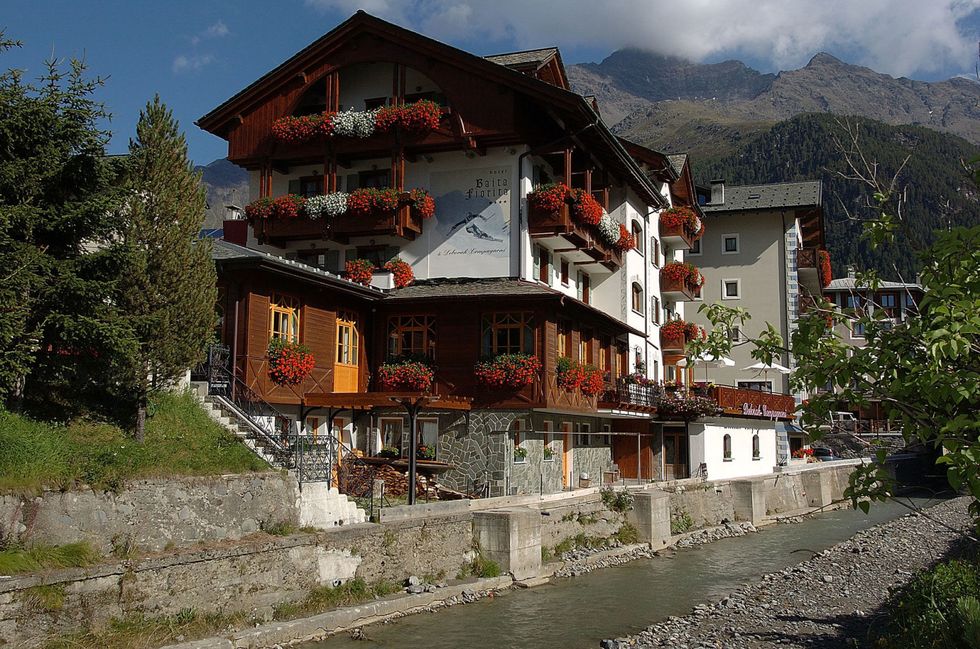 Mountain village, House, Property, Building, Architecture, Hill station, Mountain, Mountain range, Alps, Home, 