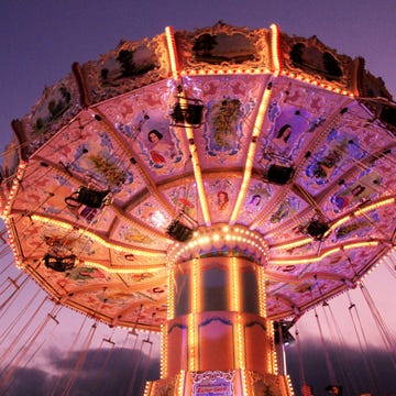 Amusement ride, Amusement park, Landmark, Fair, Fun, Light, Night, Purple, Tourist attraction, Carousel, 