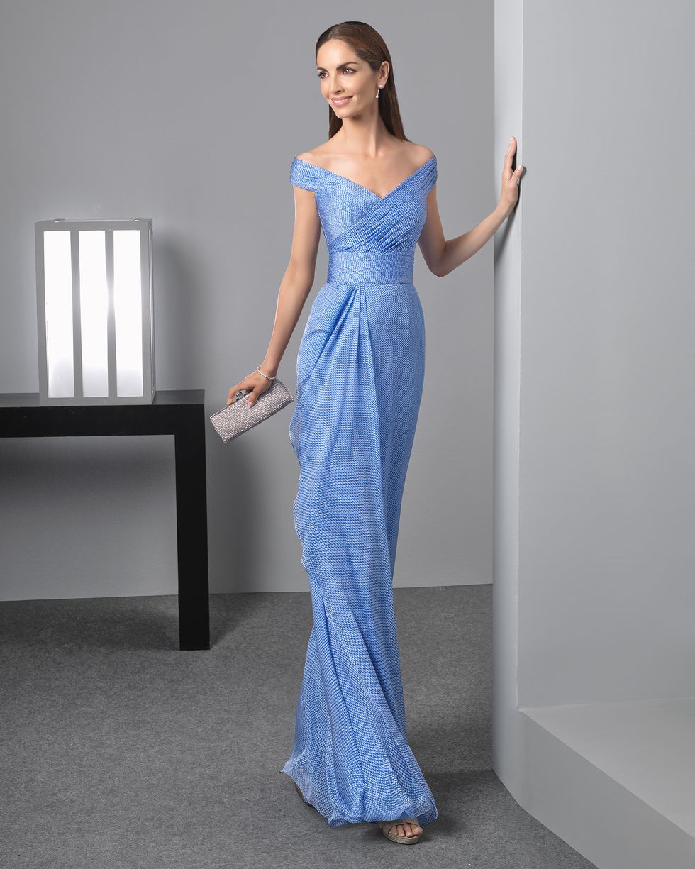 Clothing, Blue, Dress, Sleeve, Shoulder, Textile, Joint, Standing, Formal wear, One-piece garment, 