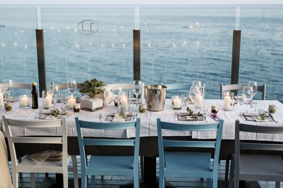 Restaurant, Blue, Table, Room, Furniture, Turquoise, Rehearsal dinner, Sea, Chair, Vacation, 