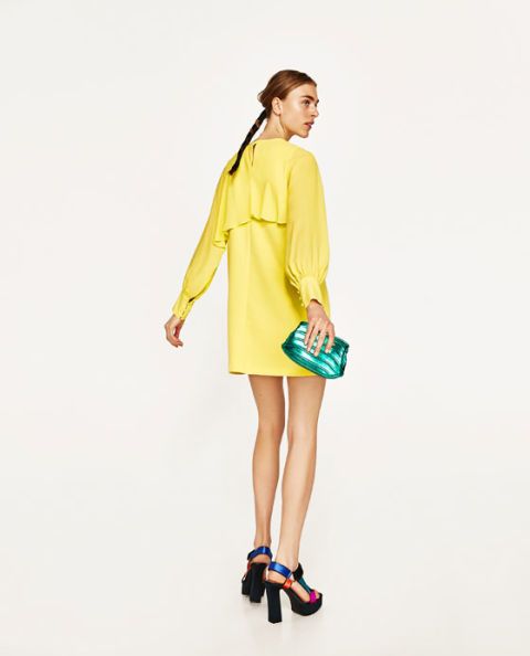 Clothing, Yellow, Fashion model, Shoulder, Dress, Turquoise, Footwear, Sleeve, Fashion, Joint, 