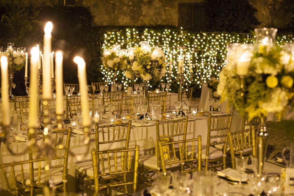 Decoration, Yellow, Wedding banquet, Chiavari chair, Lighting, Candle, Function hall, Floral design, Centrepiece, Flower Arranging, 