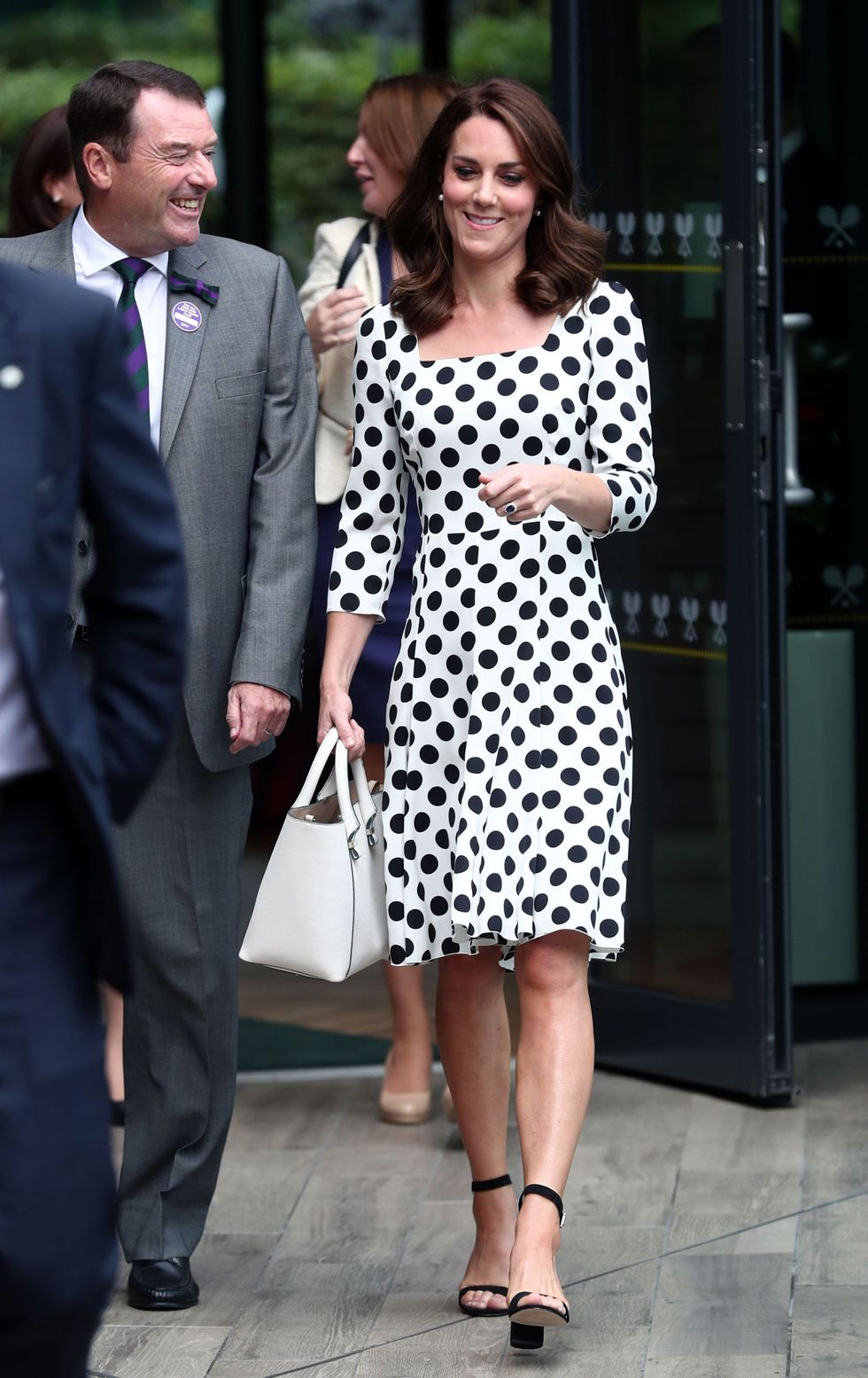 LONDON, UNITED KINGDOM - JULY 3:  Catherine, Duchess of Cambridge, Patron of the All England Lawn Tennis and Croquet Club (AELTC) with Philip Brook (left) on day one of the Wimbledon Championships at The All England Lawn Tennis and Croquet Club, in Wimbledon on July 3, 2017 in London, England.  (Photo by Gareth Fuller - WPA Pool/Getty Images)